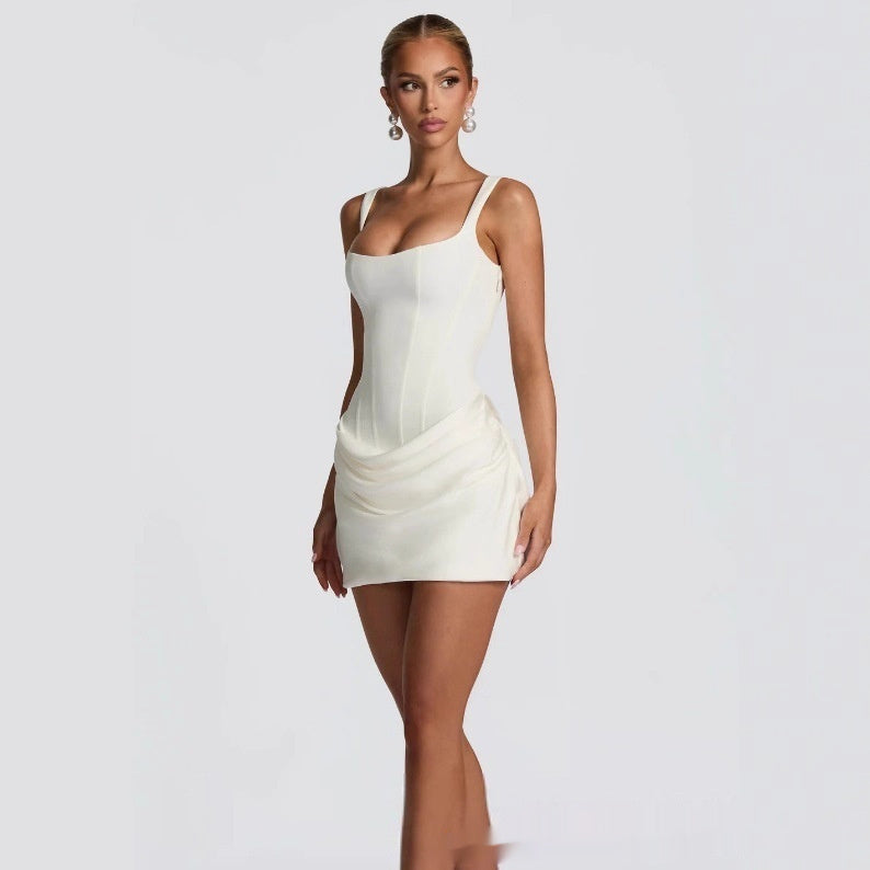Elegant black tube top short strap dress by M Chic Boutique, featuring a fitted silhouette and stylish strap details.