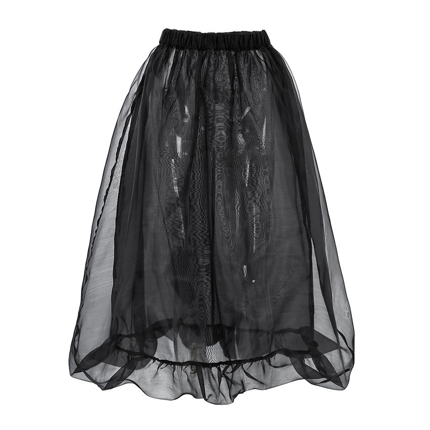 Black mesh high waist skirt from M Chic Boutique, featuring a flowy silhouette and layered design for a stylish look.