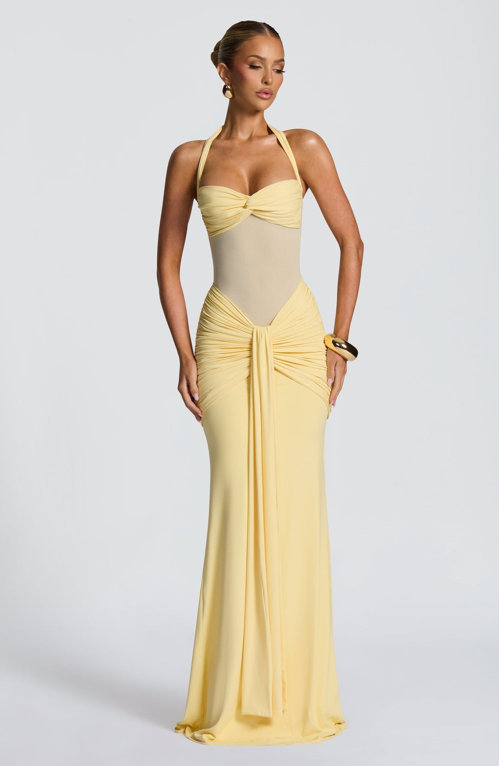 Slim-fit Ribbon Sheath Dress by M Chic Boutique showing a sleek, elegant dress with a ribbon detail, perfect for formal occasions.