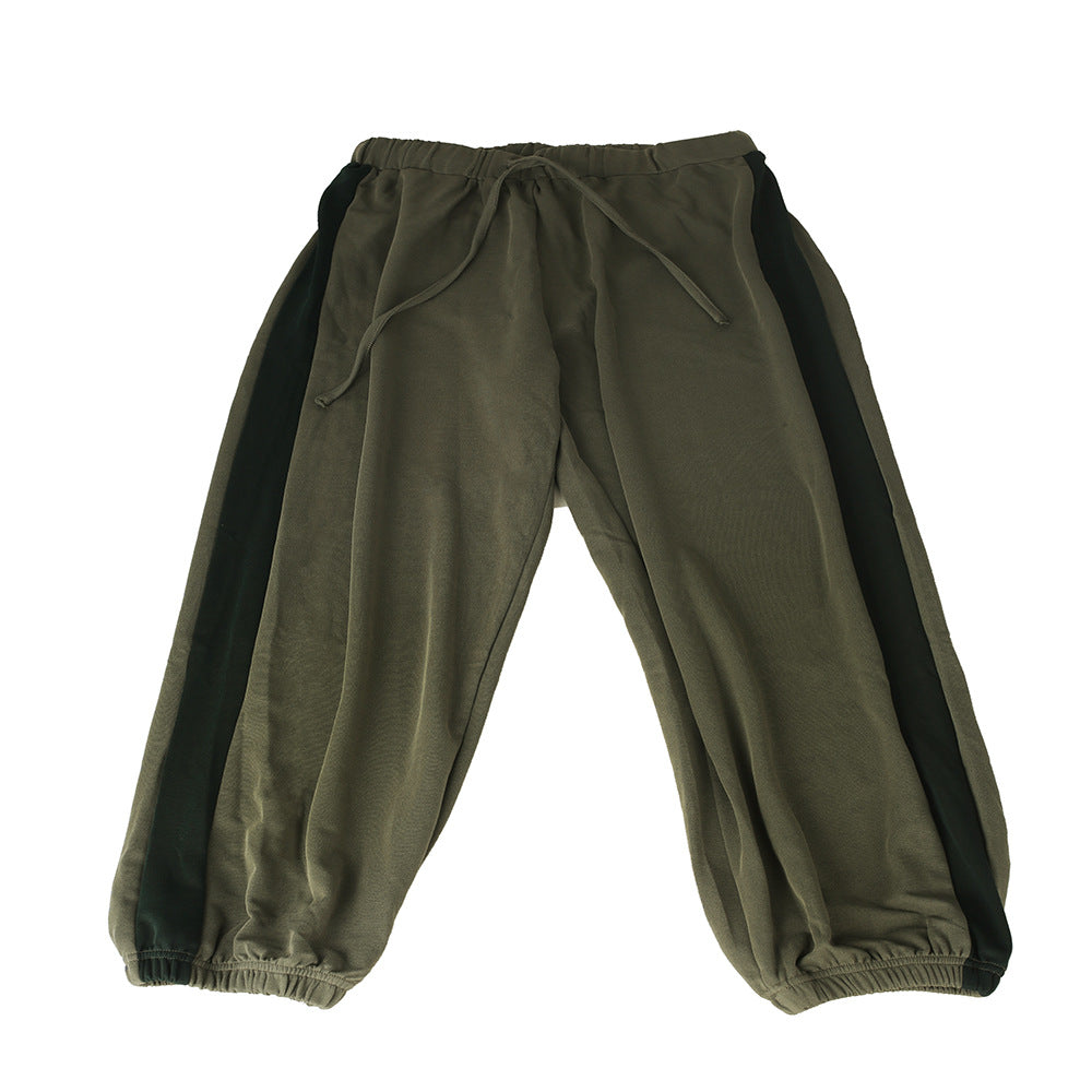 Black hooded sports suit from M Chic Boutique activewear set, featuring a hoodie and matching athletic pants.