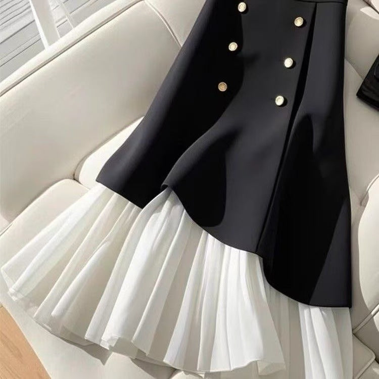 Splicing half skirt with buttons from M Chic Boutique, featuring a stylish design and tailored fit.