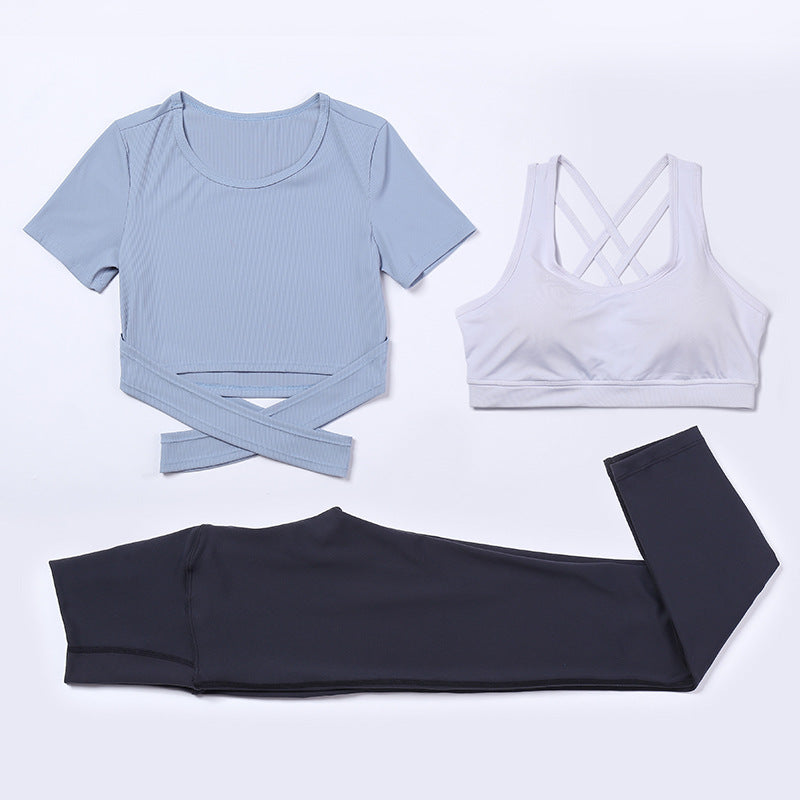 M Chic Boutique three-piece gym and yoga activewear set with matching top, leggings, and sports bra for workout comfort.