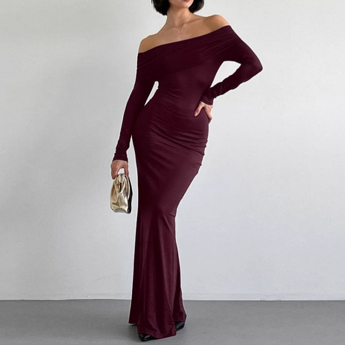 Off-the-shoulder sheath dress by M Chic Boutique, featuring a fitted silhouette and elegant design in a soft fabric.