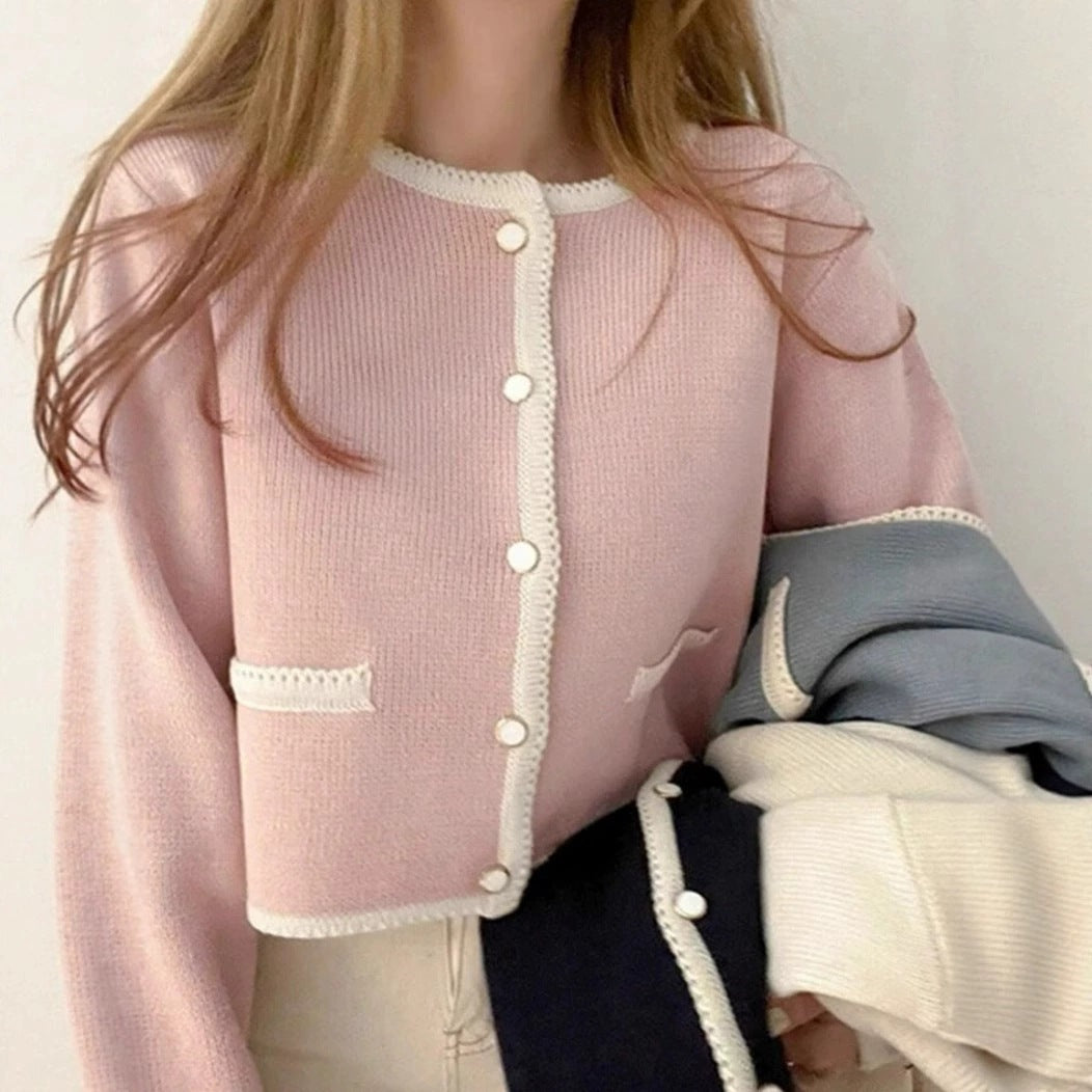 Single-breasted knitted cardigan coat in a soft fabric, featuring a classic design from M Chic Boutique.