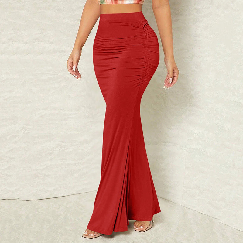 M Chic Boutique mermaid pencil skirt in vibrant color with a fitted silhouette and flared hem, showcased on a model.