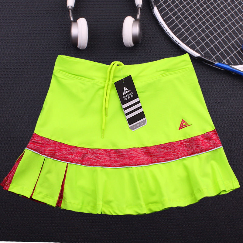 Black quick-drying tennis skirt by M Chic Boutique, made of breathable activewear fabric with a comfortable fit.