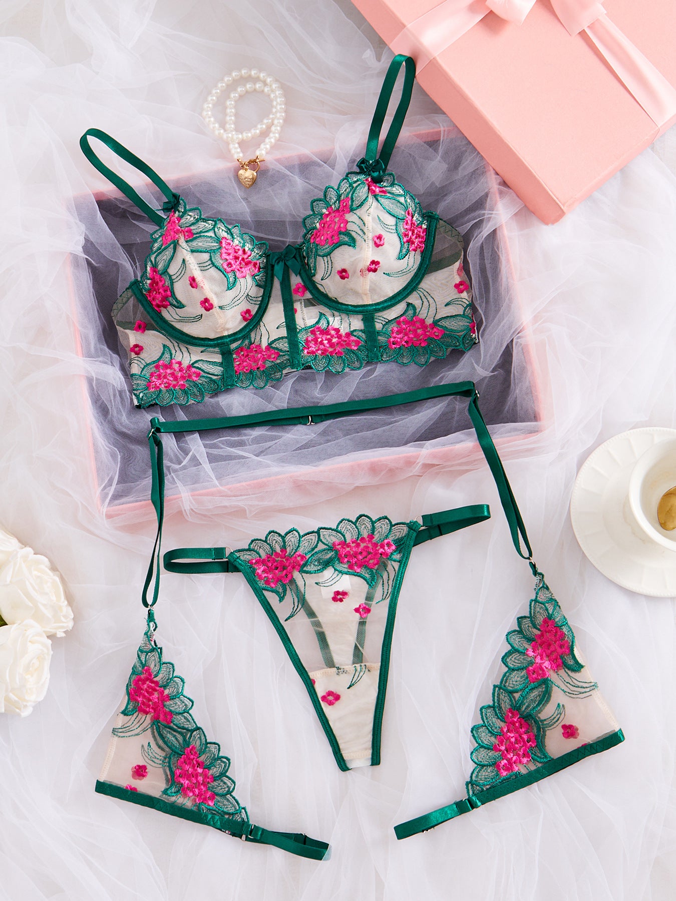See-through sexy lingerie set with lace and sheer fabric, featuring strappy details, from M Chic Boutique's intimate apparel collection.