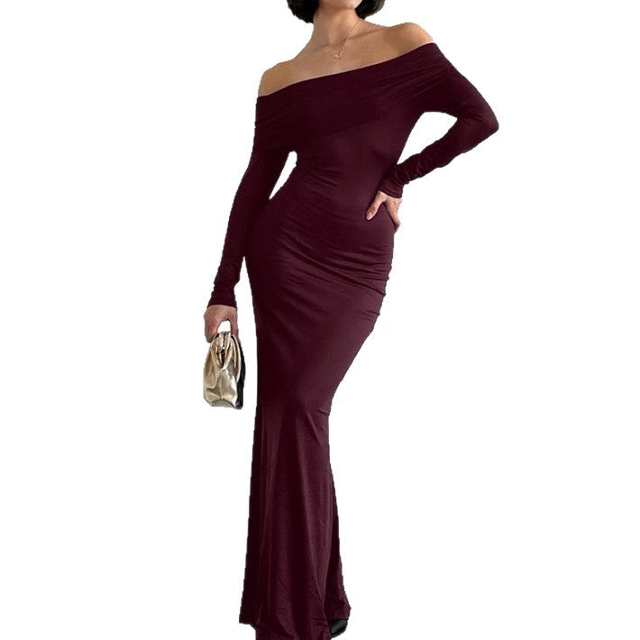 Off-the-shoulder sheath dress in a stylish design by M Chic Boutique, showcasing elegant silhouette and fabric texture.