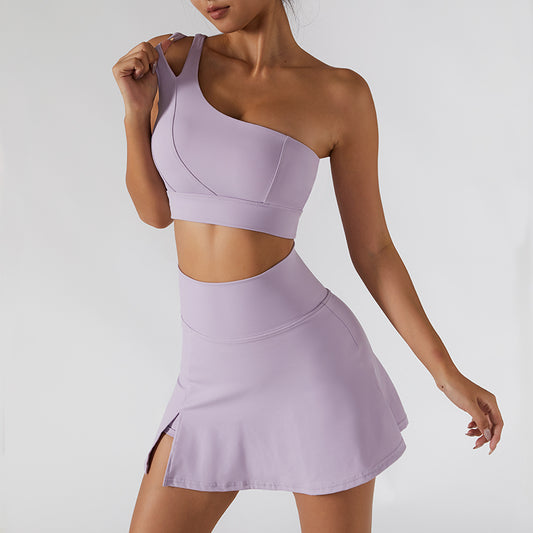 Ribbed one-shoulder gym set by M Chic Boutique featuring a fitted activewear top and matching leggings on a white background.