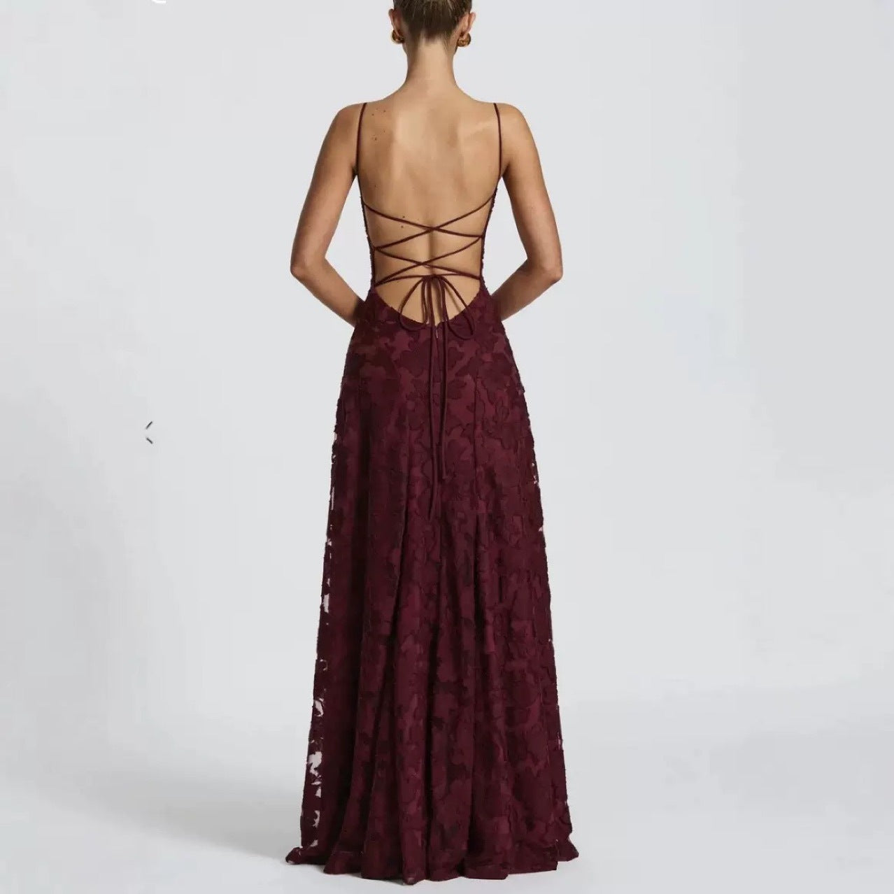 Backless lace-up design dress from M Chic Boutique, featuring a stylish and elegant dress with intricate lace details.