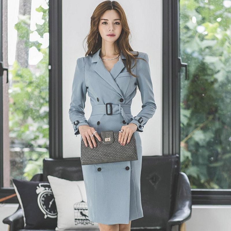 Double-breasted dress in navy from M Chic Boutique, featuring a tailored fit and stylish button details.
