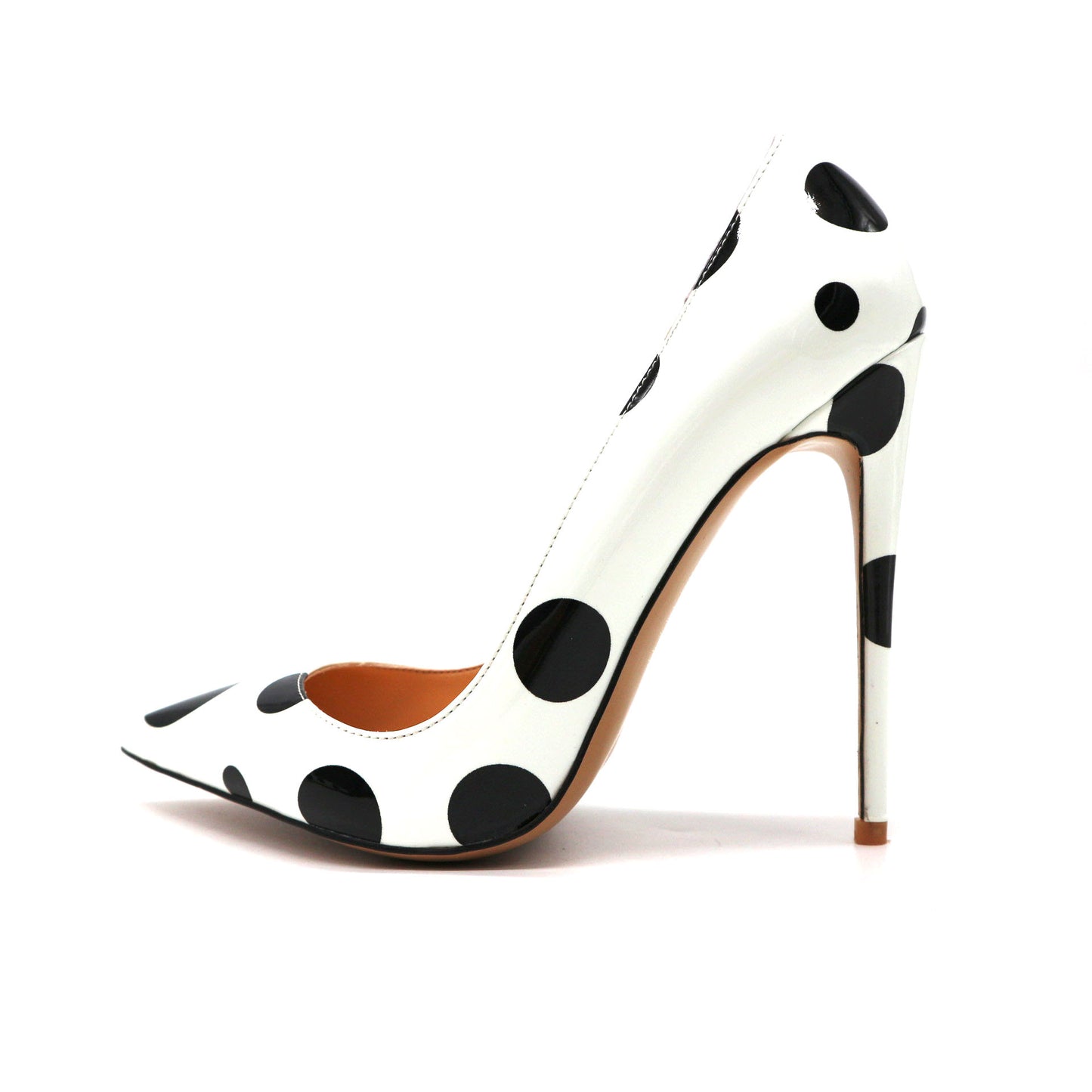 Polka dot leather high heels from M Chic Boutique featuring a stylish design and elegant pointed toe.