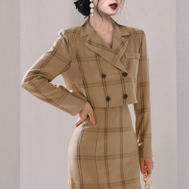 Double-breasted short suit set in light fabric, featuring tailored shorts and a fitted blazer, by M Chic Boutique.