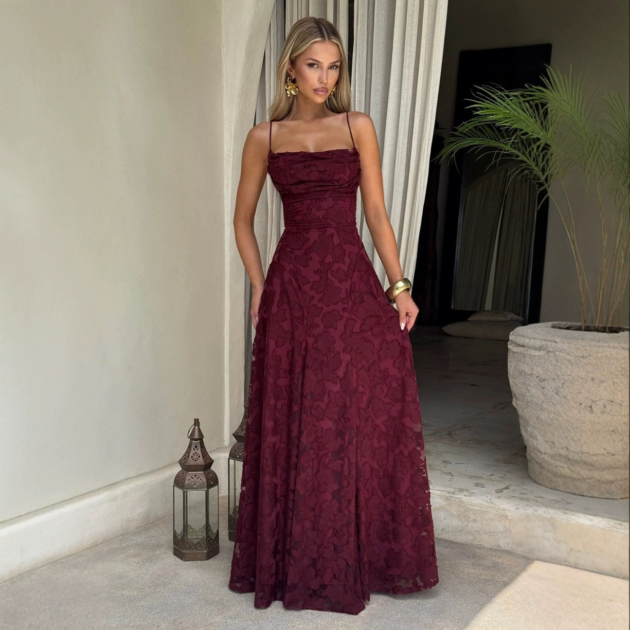 Backless lace-up design dress by M Chic Boutique, showcasing a stylish, elegant dress with intricate lace details and open back style.