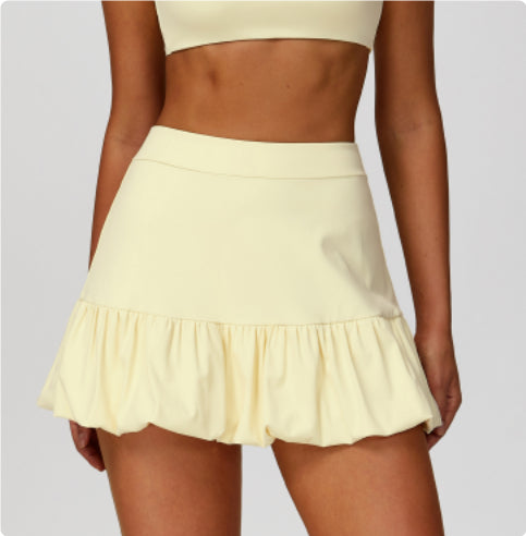 M Chic Boutique quick-drying tennis skirt for activewear, lightweight fabric, and sporty design suitable for tennis and athletic activities.