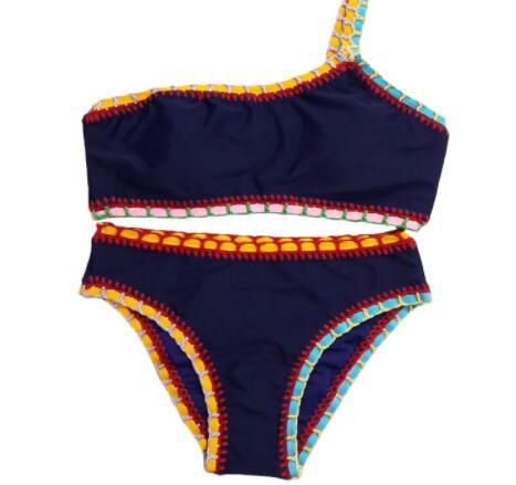 Woven bikini set swim suit by M Chic Boutique featuring a stylish, colorful woven pattern on top and matching bottoms.