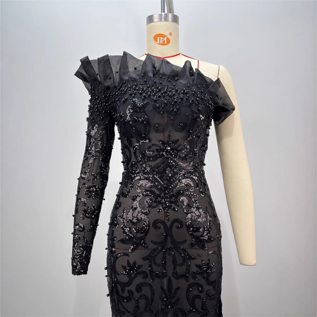 One shoulder sequins embroidery dress with a side slit, showcasing elegant detailing and a stylish silhouette.