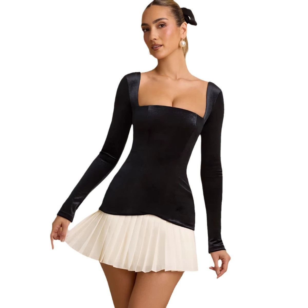 Square collar pleated dress by M Chic Boutique, featuring a stylish design and elegant pleats in a soft fabric.