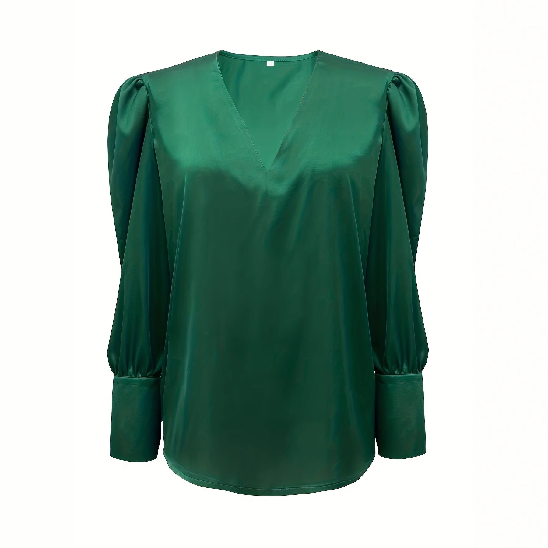 Solid-color silk satin shirt with a V-neck design, showcasing a smooth texture and elegant drape, by M Chic Boutique.