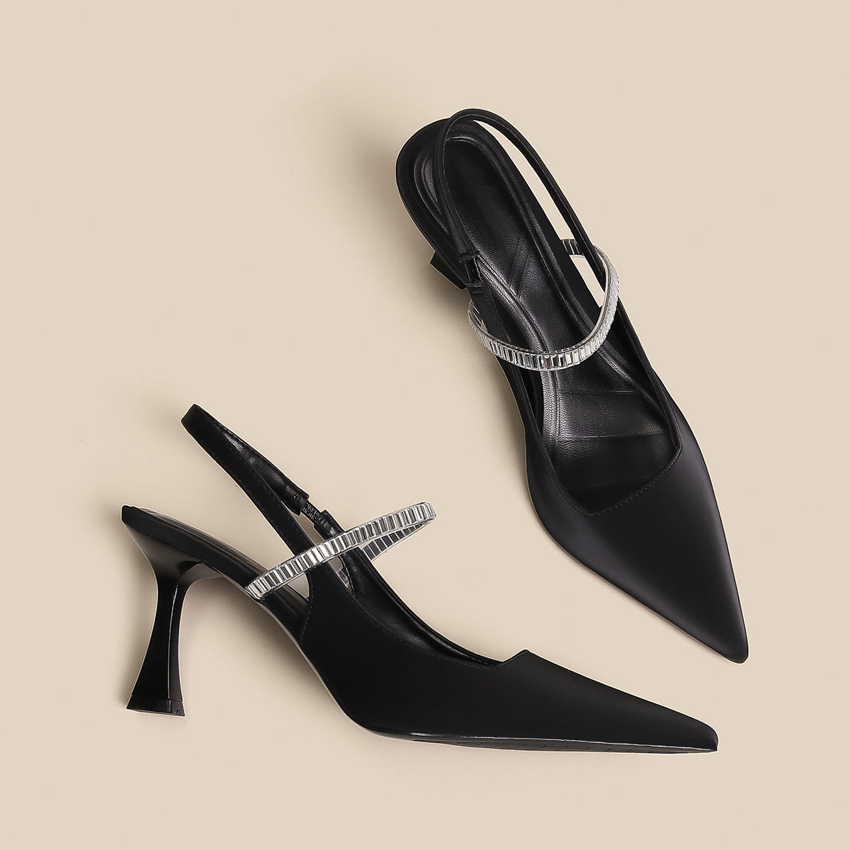 Pointed toe shoes with strap from M Chic Boutique, featuring a sleek design and elegant silhouette in a stylish color.