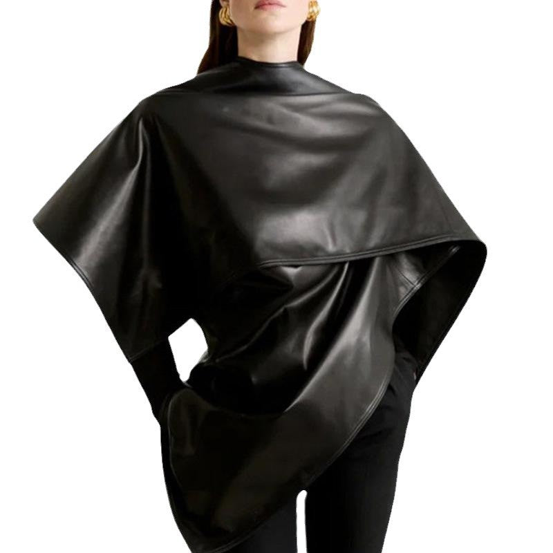 M Chic Boutique Trend Shawl Cape Coat hanging on a wooden hanger, showcasing stylish, warm outerwear with a flowing design.