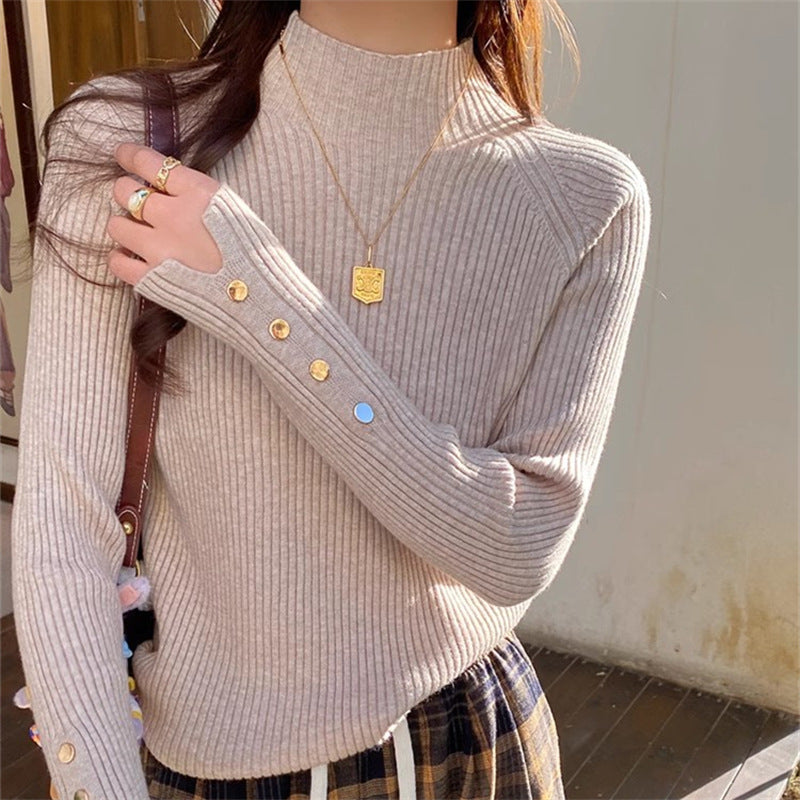Trendy semi-high collar sweater from M Chic Boutique, featuring a cozy knit design and fashionable fit in a neutral color.