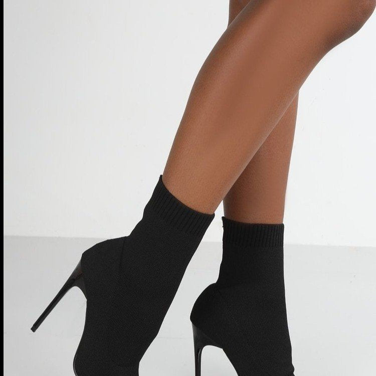 High-heel point-toe knitted boots in a stylish design, showcasing the unique texture and elegant silhouette by M Chic Boutique.