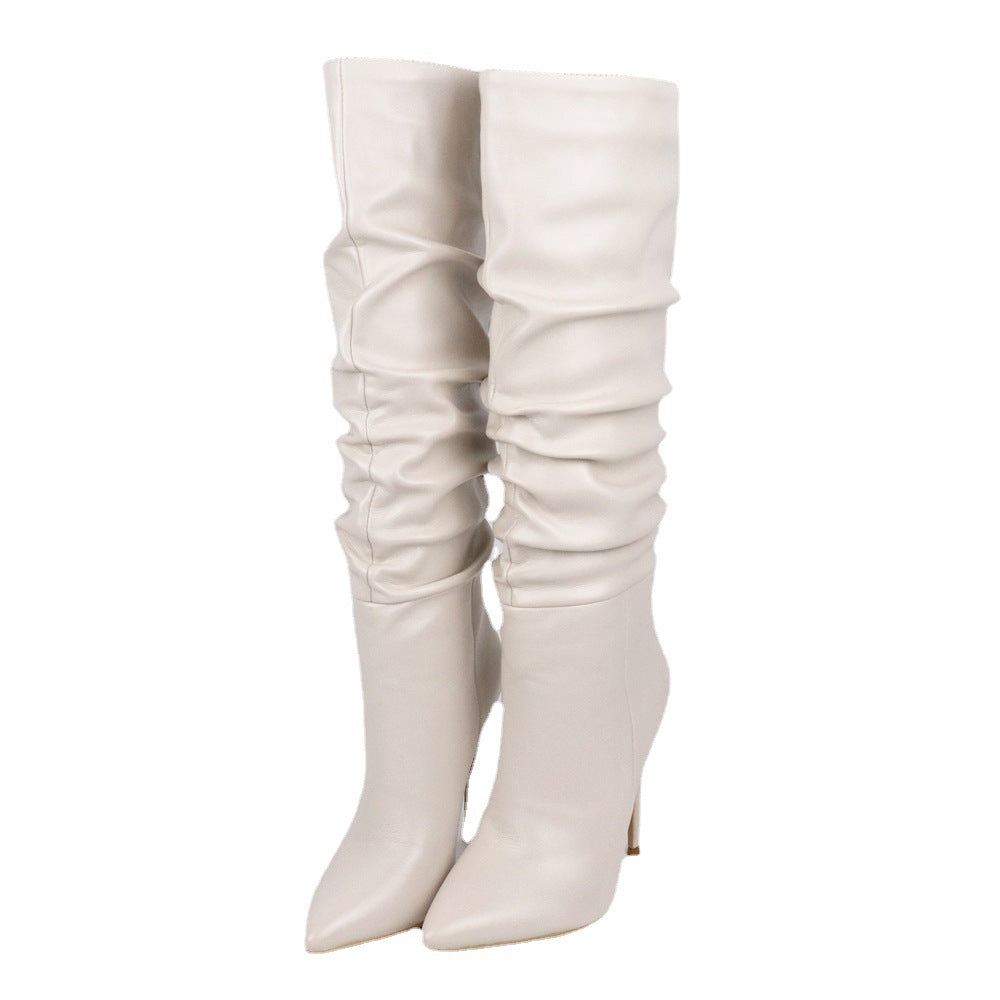 M Chic Boutique pleated pointed toe stiletto boots with sleek design and high heels, perfect for stylish footwear.