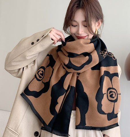Black and white versatile scarf from M Chic Boutique, stylish accessory with soft fabric and classic design.