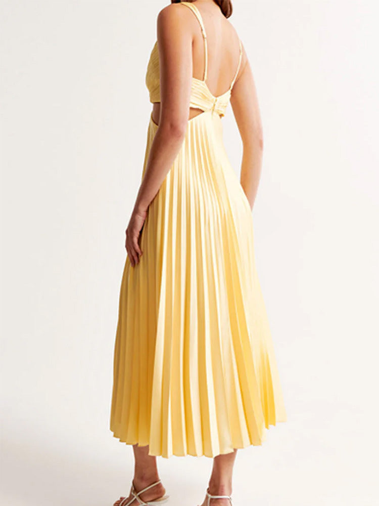 M Chic Boutique suspender pleated long dress featuring a flowy design and stylish straps, perfect for elegant occasions.