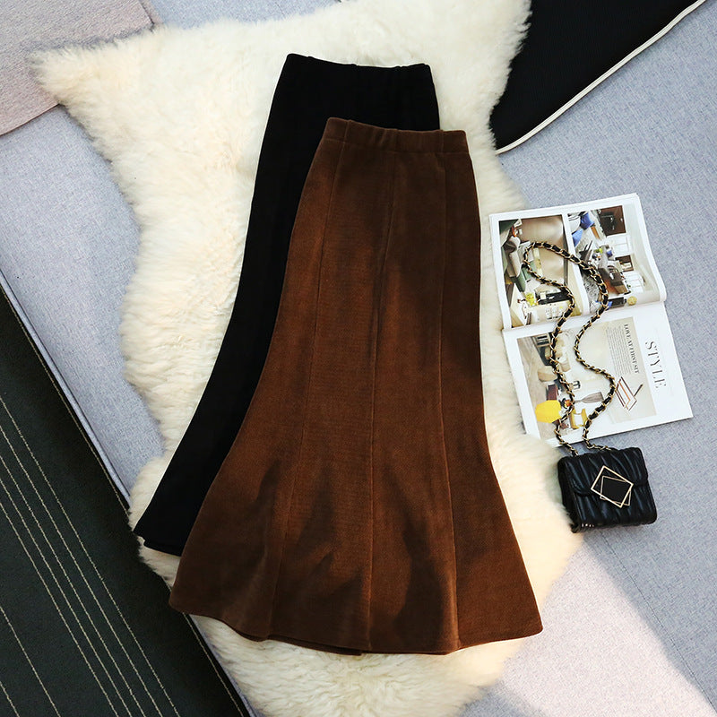 Slim fit elegant mermaid skirt by M Chic Boutique, showcasing a sleek design and flowing silhouette.