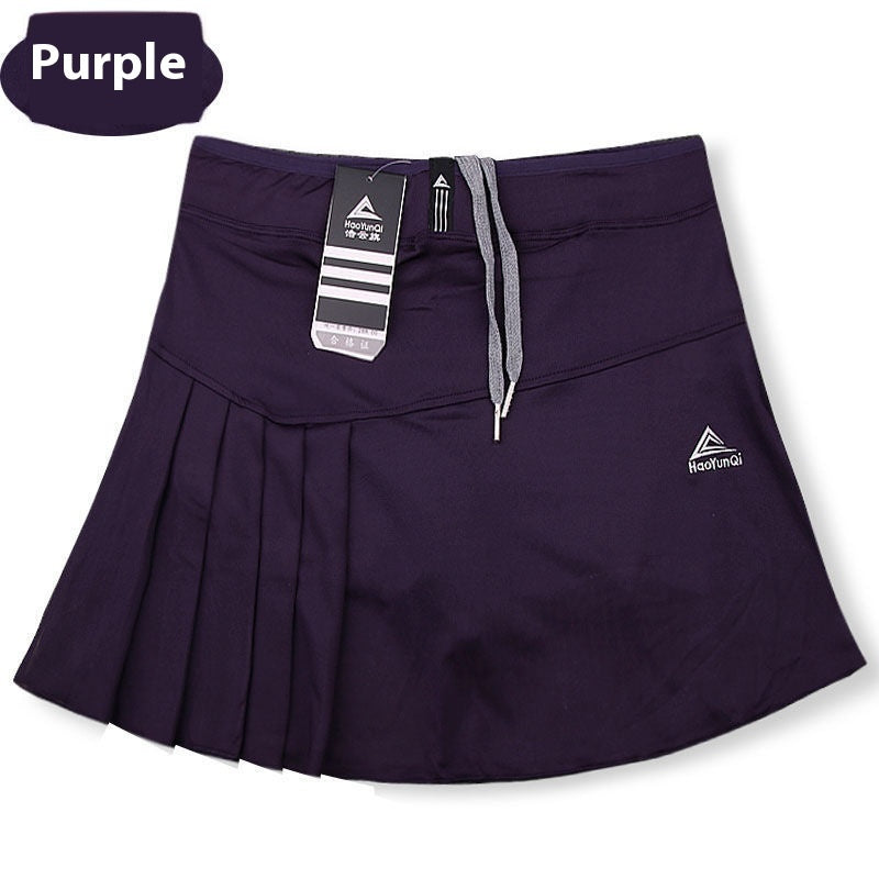 Quick-drying tennis skirt from M Chic Boutique, activewear with a sporty fit and lightweight fabric for comfortable movement.