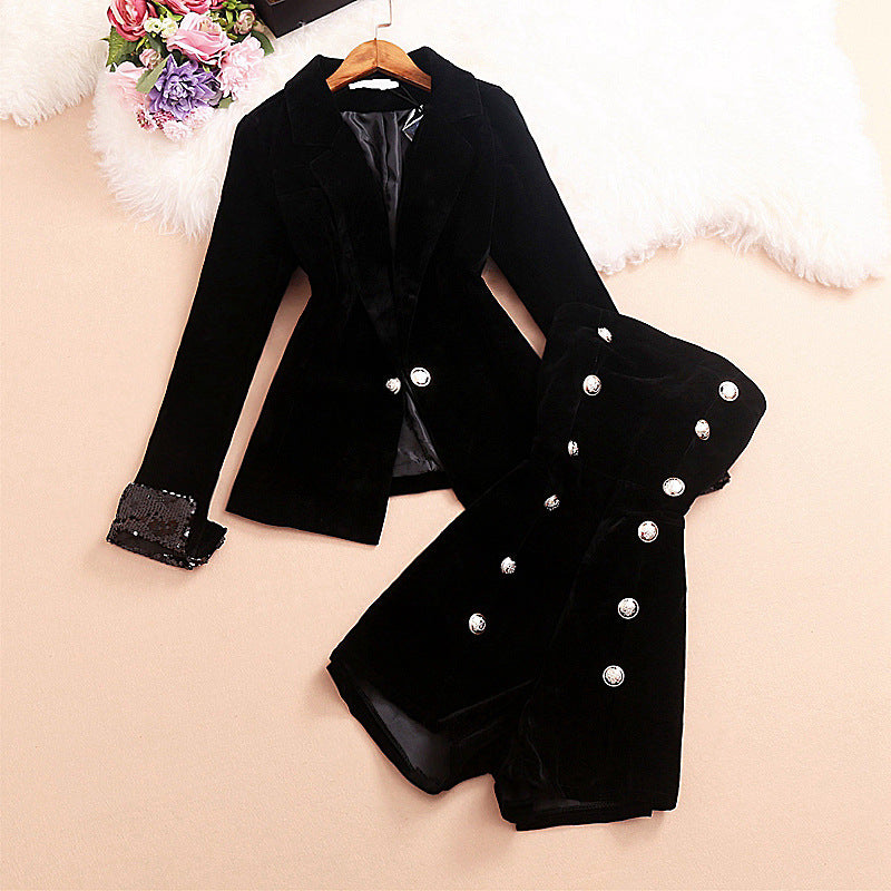 Double-breasted tube top jumpsuit two-piece set in black by M Chic Boutique, showcasing stylish design and fitted silhouette.