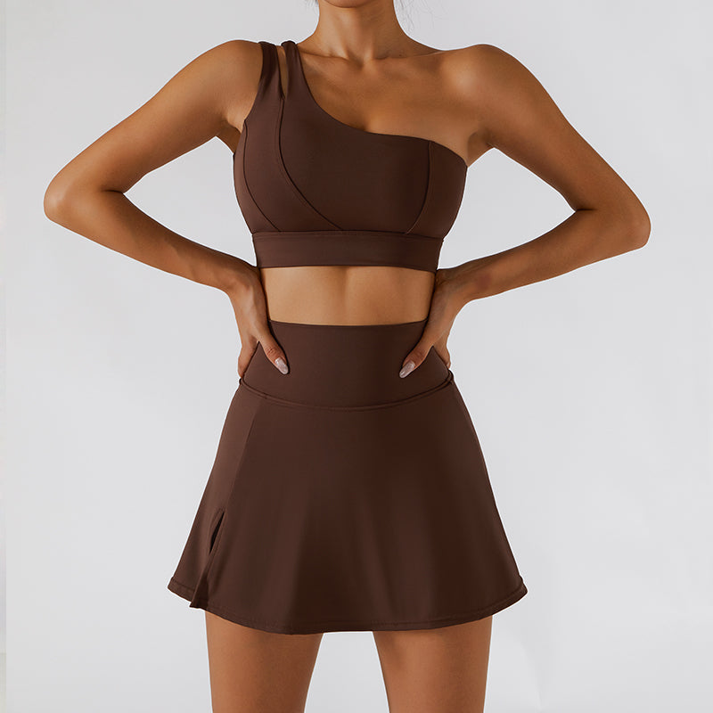 Ribbed one-shoulder gym set by M Chic Boutique featuring a fitted activewear top and matching high-waisted leggings.