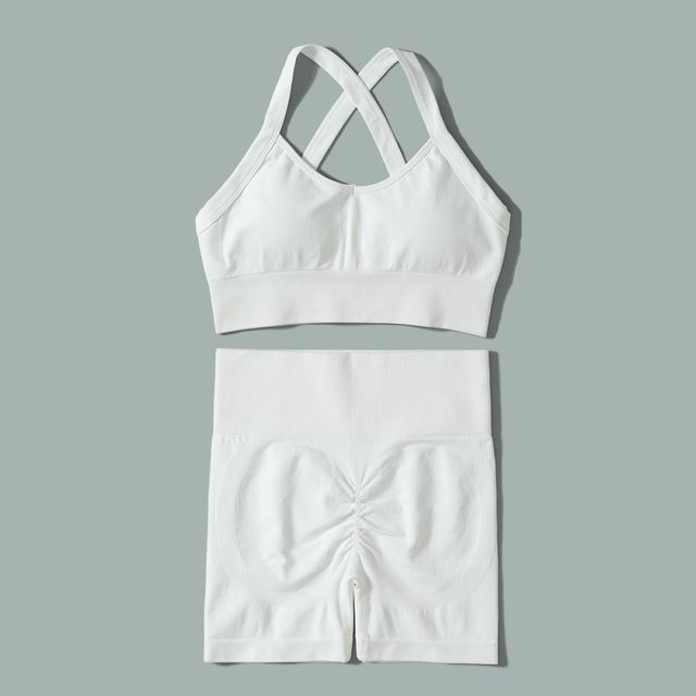 M Chic Boutique sport solid color activewear set with matching top and leggings on a neutral background.