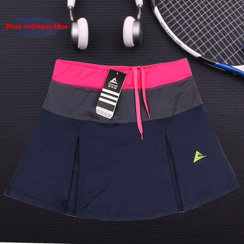 Quick-drying tennis skirt by M Chic Boutique, activewear with lightweight fabric and sporty design for on-court performance.