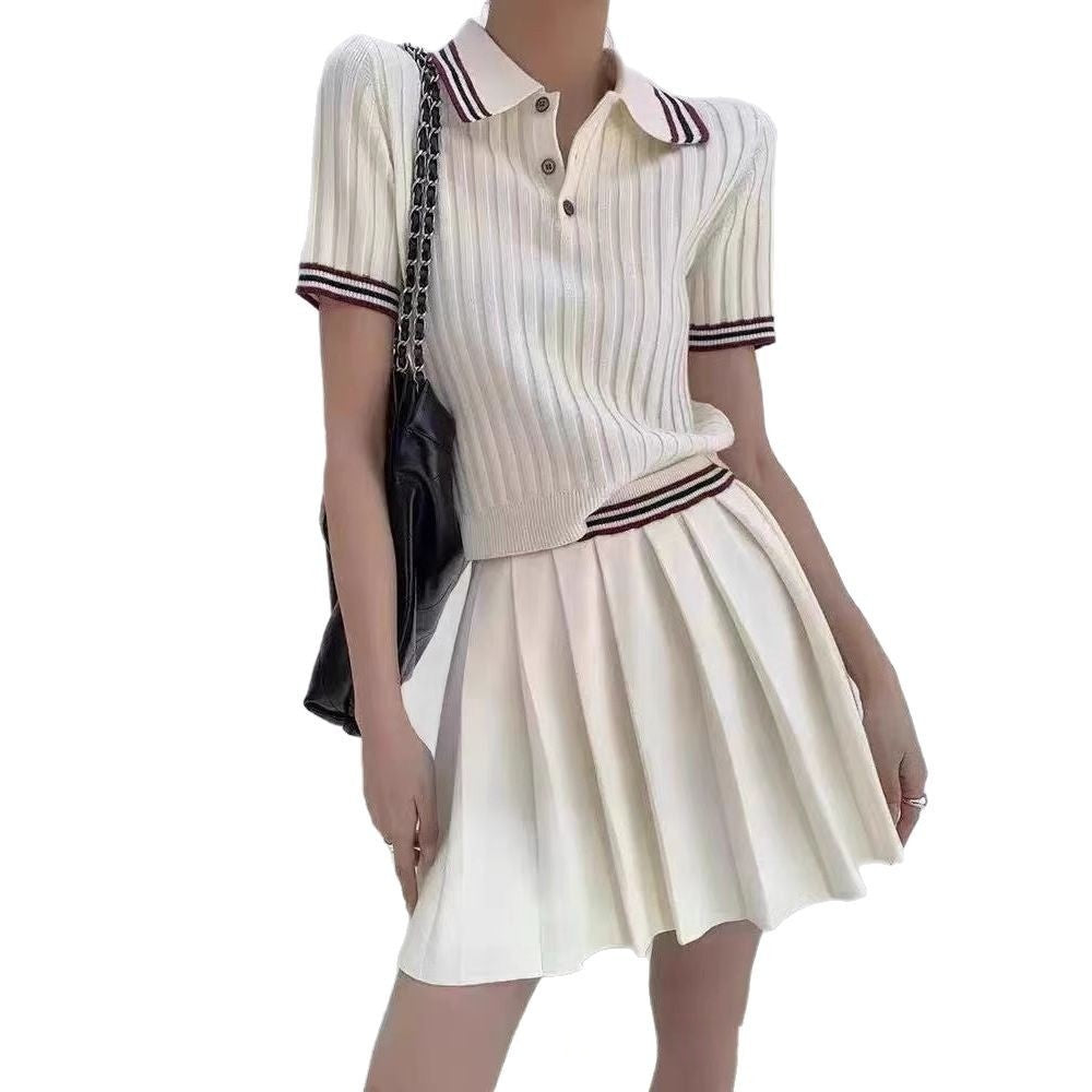 Water-themed image of a two-piece knitted pleated short skirt set by M Chic Boutique, featuring a cozy knit fabric and stylish design.
