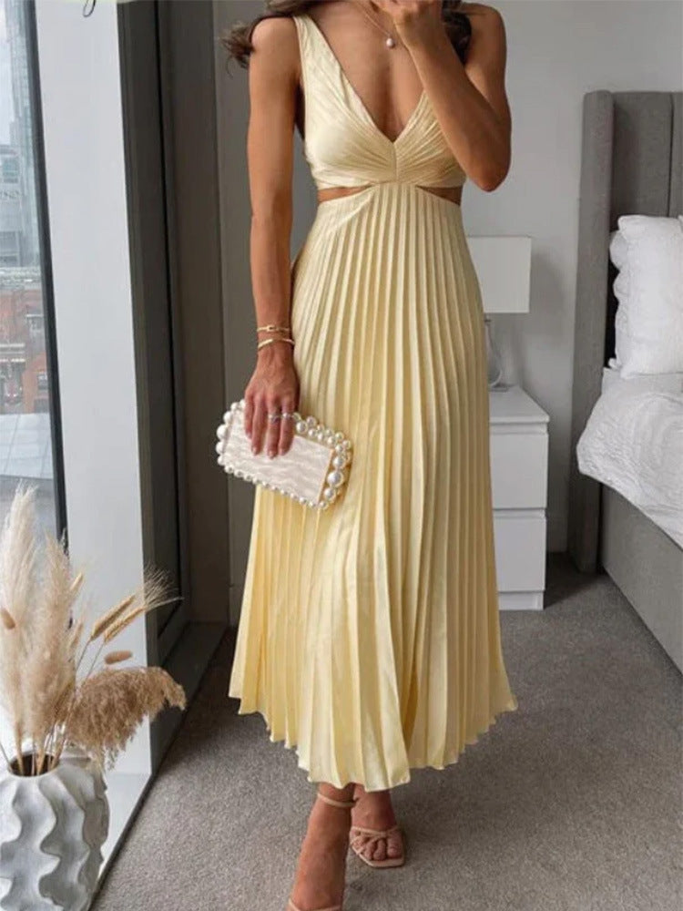M Chic Boutique suspender pleated long dress with straps, flowing fabric, and elegant style, shown on a hanger.
