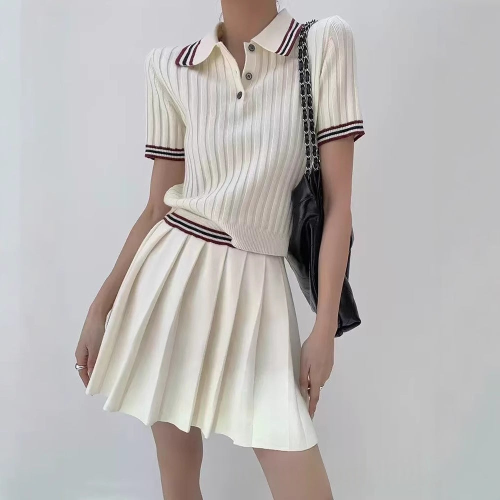 Short knitted pleated skirt and matching top two-piece set from M Chic Boutique, featuring a stylish, textured design.