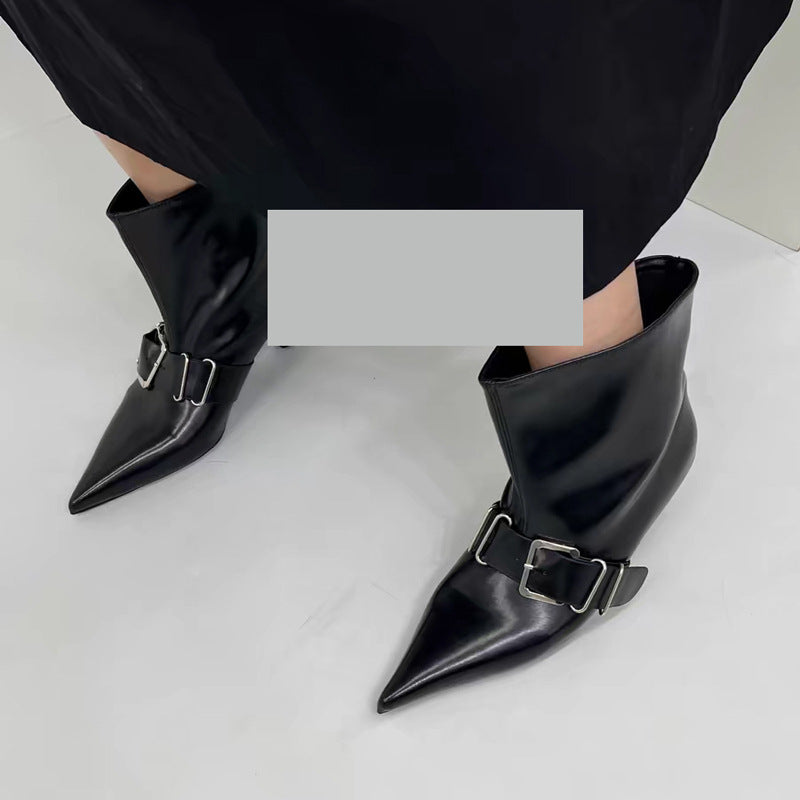High heel pointed ankle boots in black leather from M Chic Boutique, featuring a sleek design and stylish silhouette.