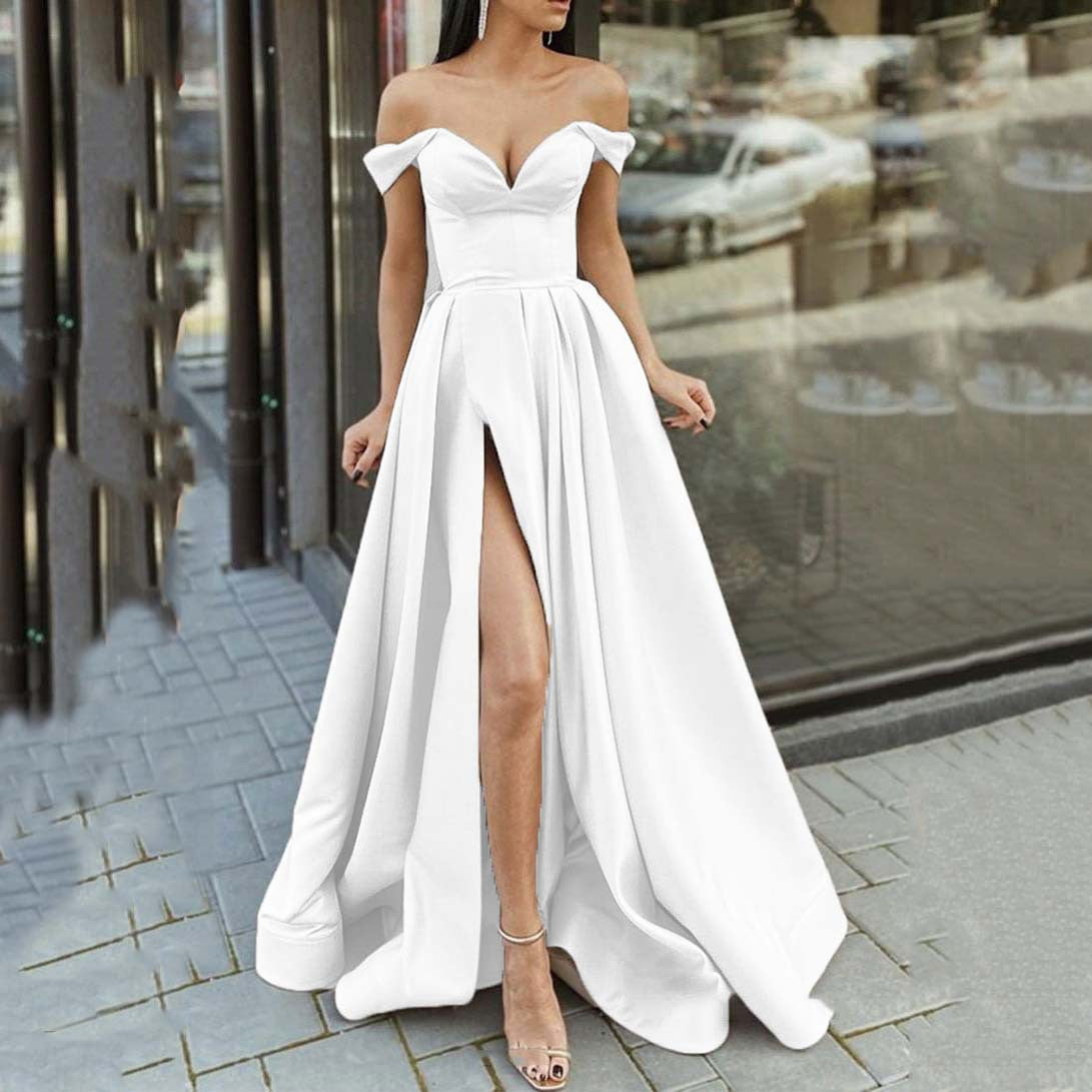 V-neck backless tube top dress by M Chic Boutique featuring sleek fabric and stylish design on a model.