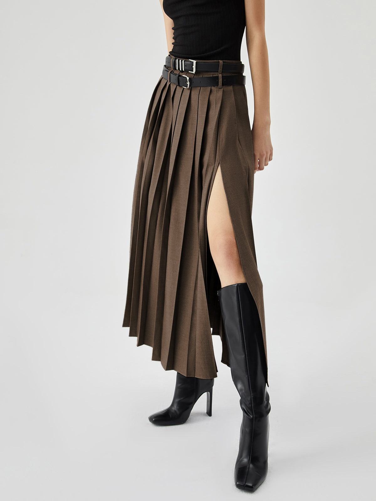 High waist slit pleated skirt in flowy fabric, showcasing elegant pleats and a stylish slit, perfect for chic outfits.