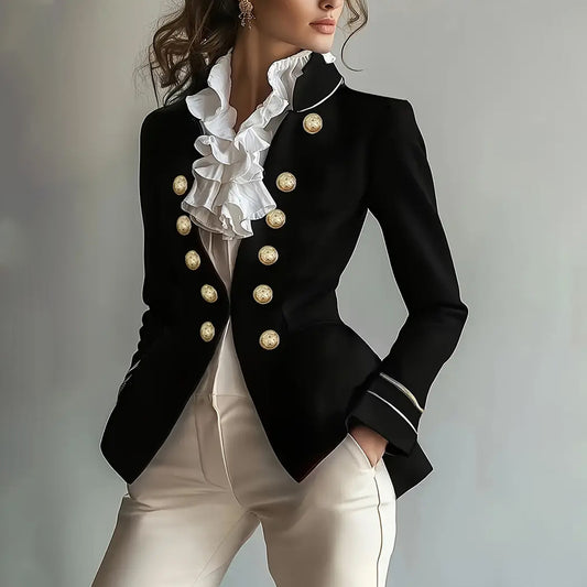 Elegant high-end coat from M Chic Boutique displayed on a mannequin, showcasing its luxurious fabric and sophisticated design.