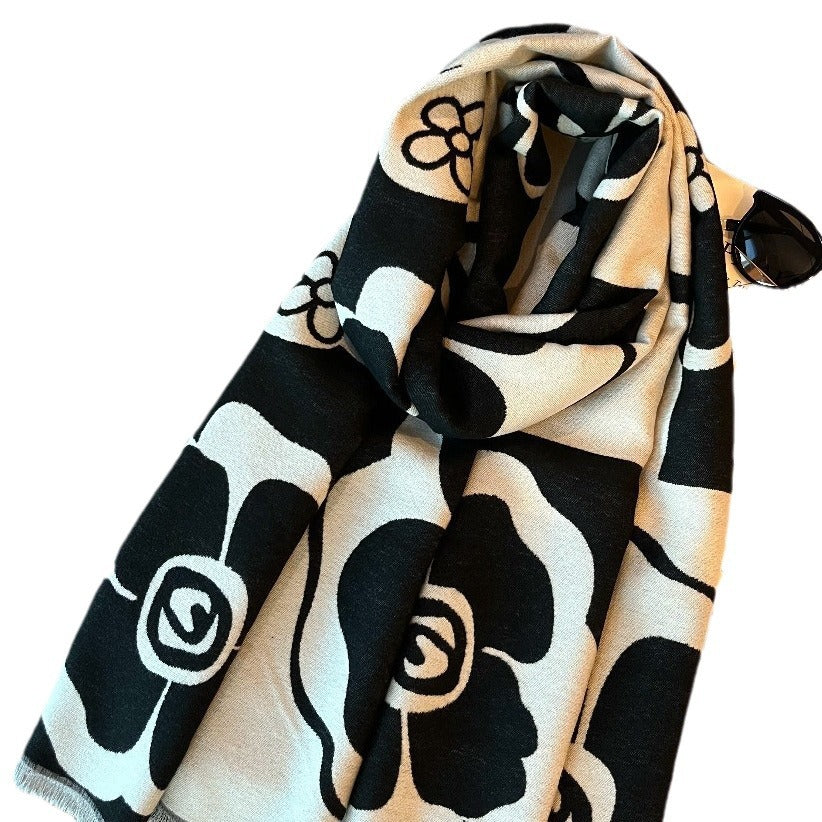 Black and white versatile scarf from M Chic Boutique, accessories display with stylish fabric and classic pattern.