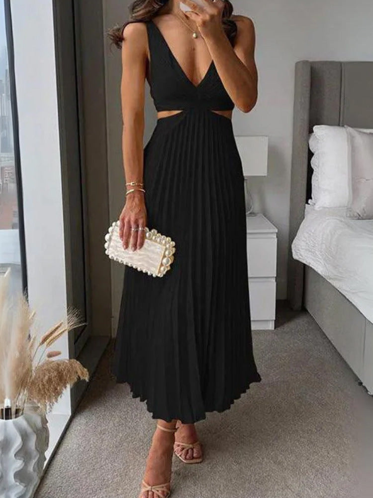 M Chic Boutique suspender pleated long dress with adjustable straps and flowing fabric, stylish and elegant for any occasion.