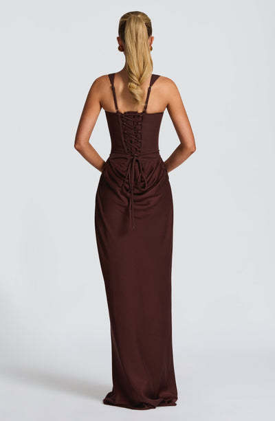 Strapless sleeveless sheath maxi dress by M Chic Boutique, featuring fitted bodice and flowing length for elegant style.