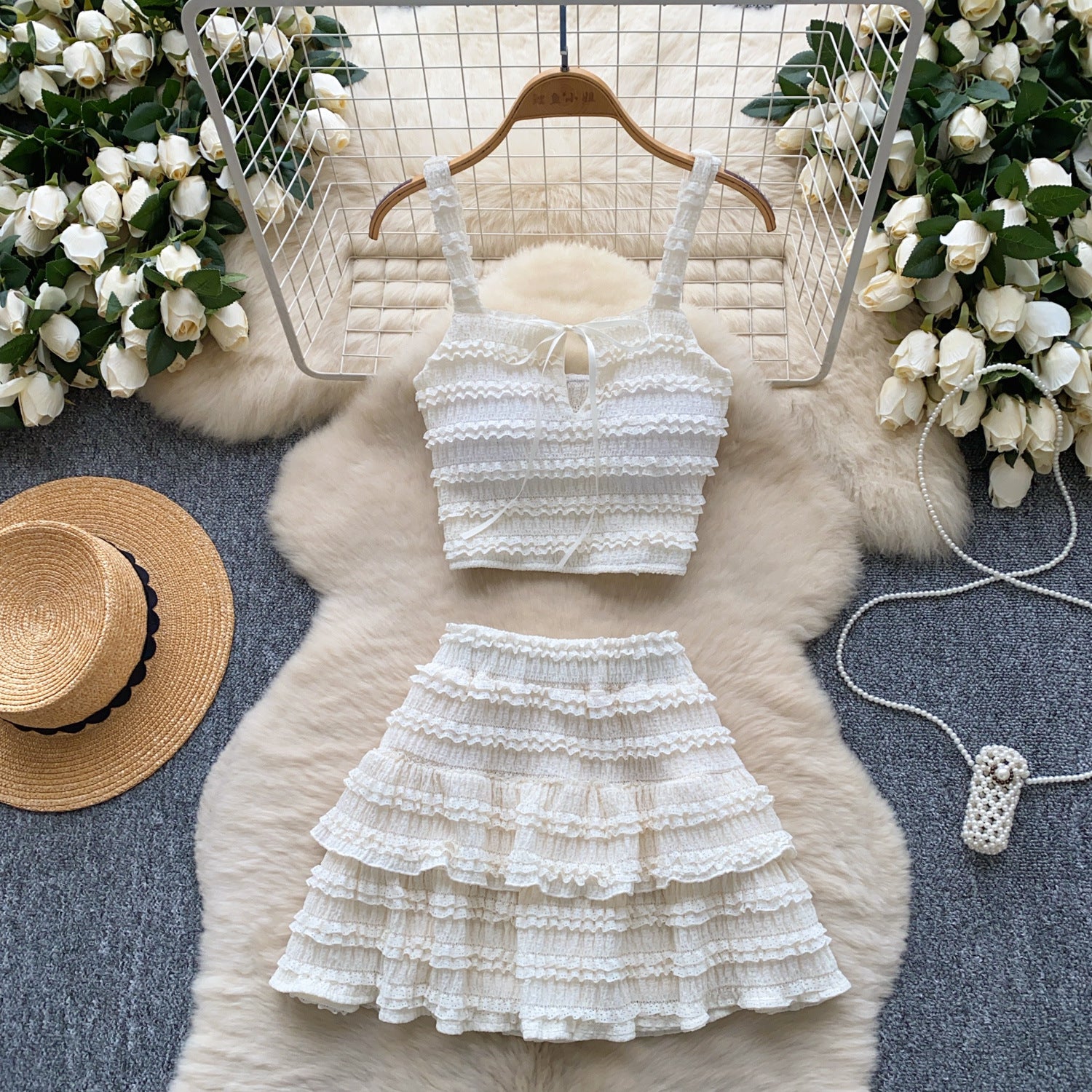 M Chic Boutique two-piece square-neck slip dress set with high waist and pleated ruffled hem, displayed on a hanger.